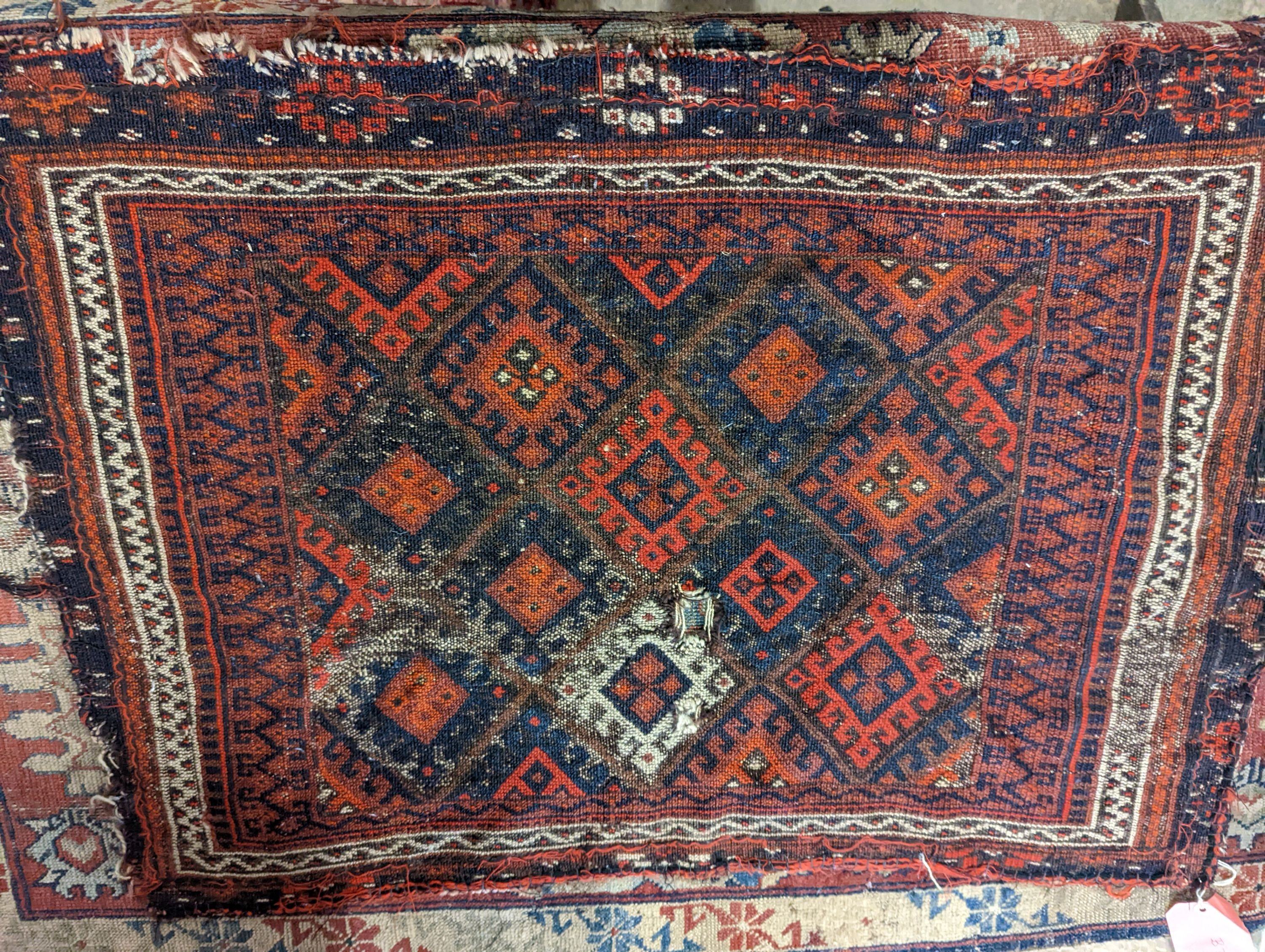 An antique Kuba rug, 118 x 84cm, a Kurdistan bag face, a Belouch bag face and two small rugs